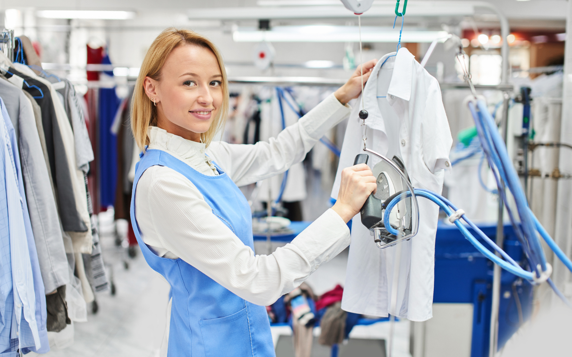 Daily Ironing Service team providing expert garment care with professional pressing equipment